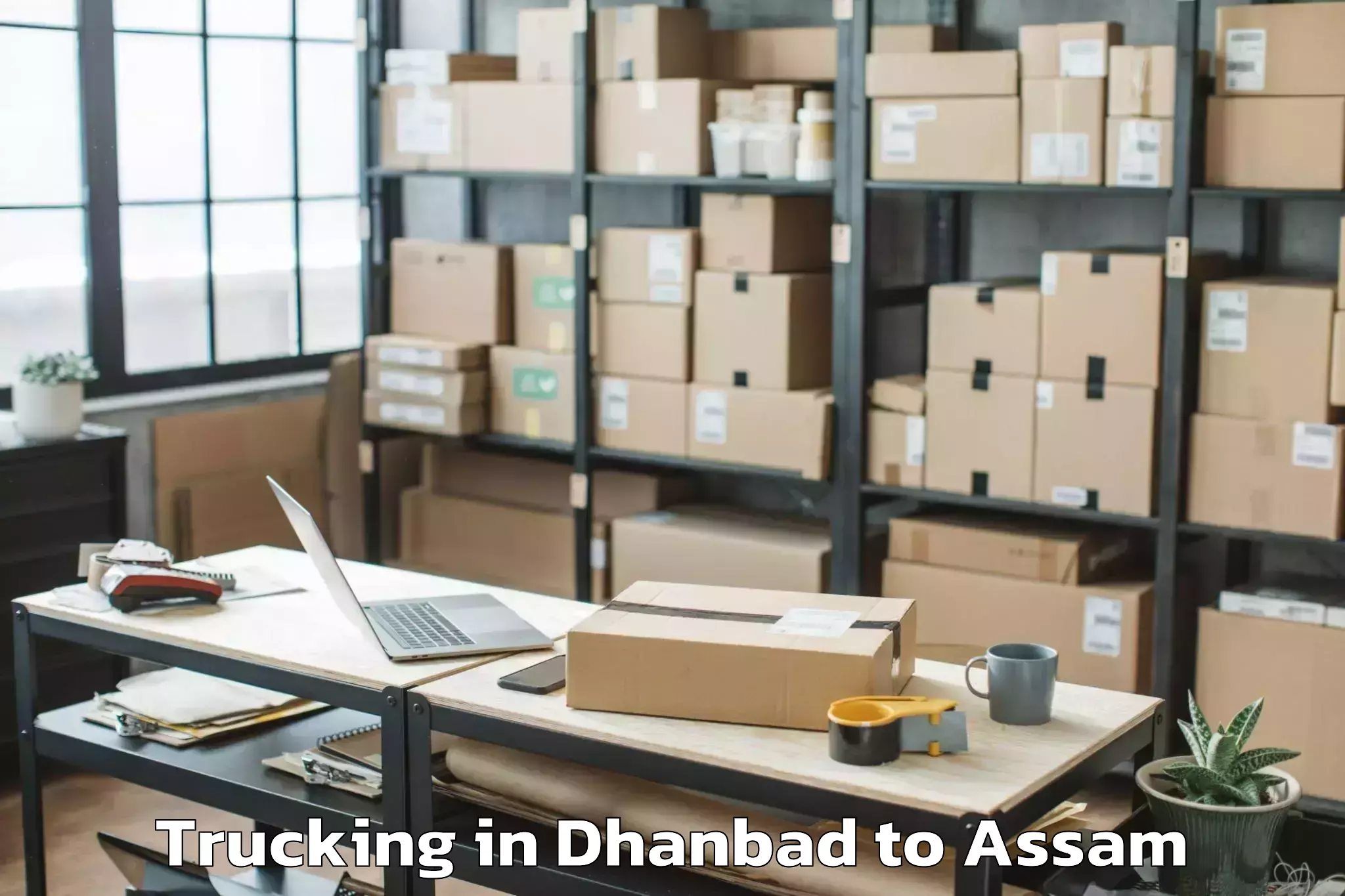 Leading Dhanbad to Sarupeta Pt Trucking Provider